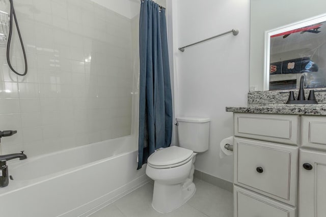 full bathroom with tile patterned flooring, vanity, toilet, and shower / bath combo with shower curtain