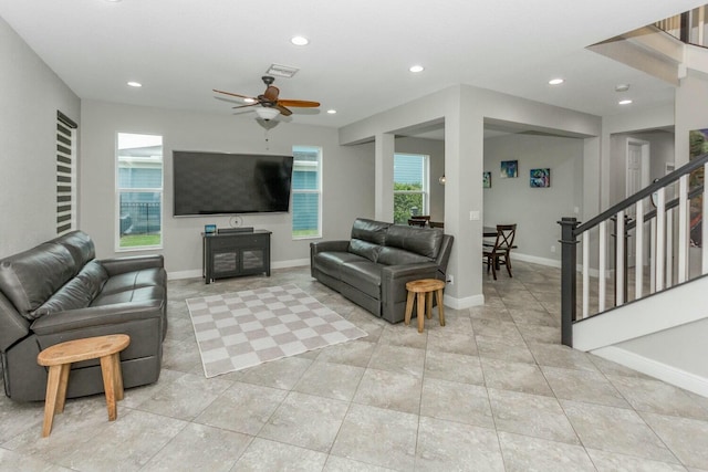 living room with ceiling fan