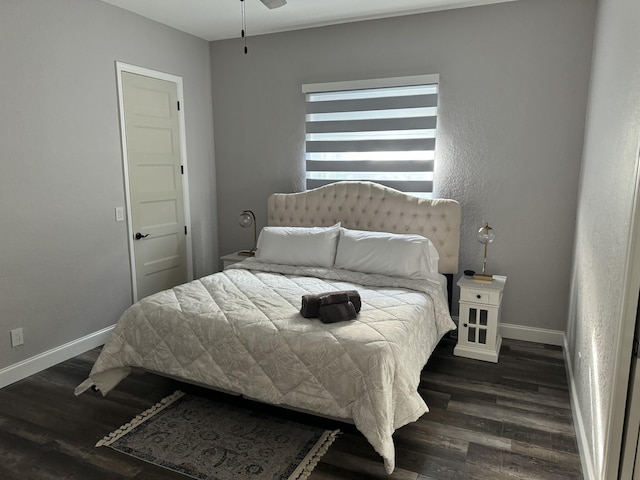 bedroom featuring dark wood-type flooring