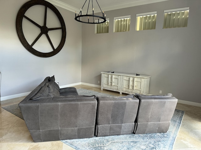 living room with an inviting chandelier and ornamental molding