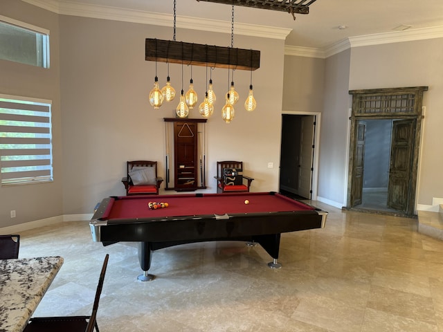 game room featuring a towering ceiling, ornamental molding, and pool table