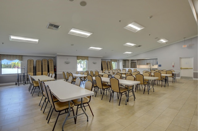 dining area with lofted ceiling