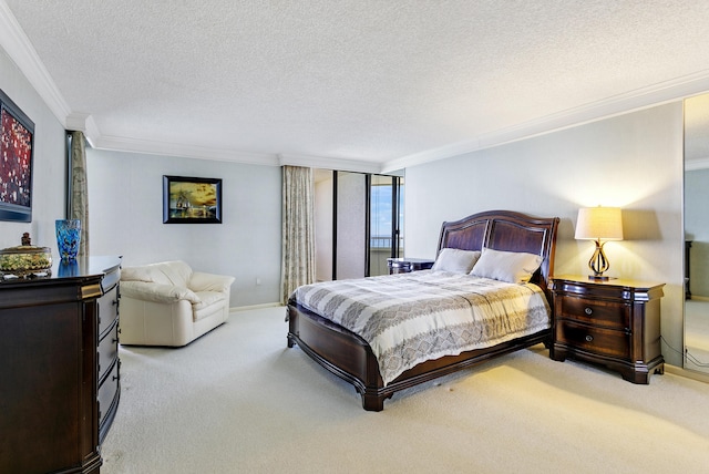 bedroom with crown molding, light colored carpet, and a textured ceiling