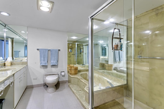 full bathroom with vanity, tile patterned floors, independent shower and bath, and toilet