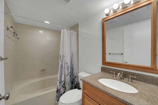 full bathroom with vanity, shower / bath combination with curtain, and toilet