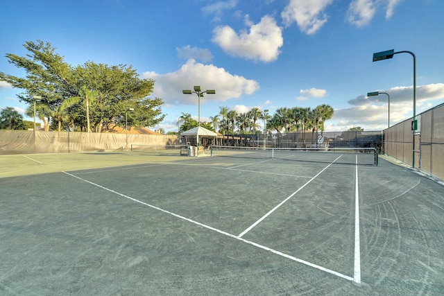 view of tennis court with a gazebo