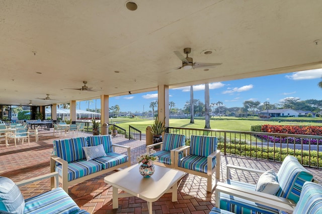 view of patio / terrace featuring outdoor lounge area and ceiling fan