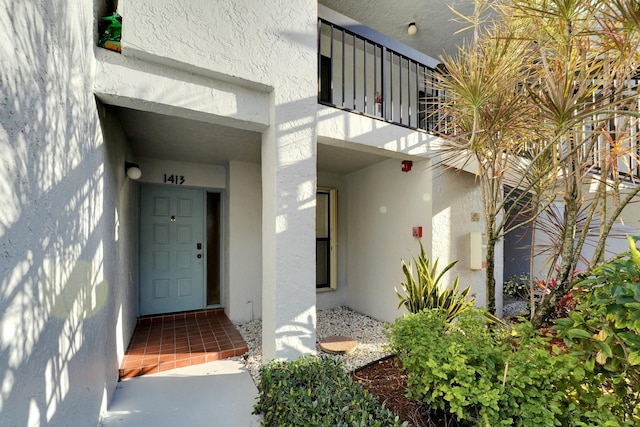 property entrance with a balcony