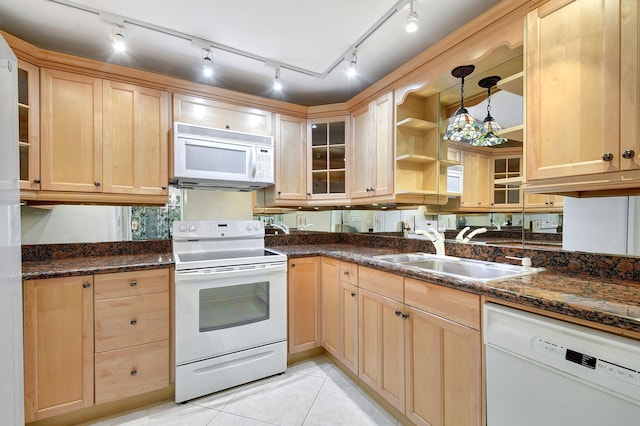 kitchen with light tile patterned floors, open shelves, light brown cabinets, a sink, and white appliances