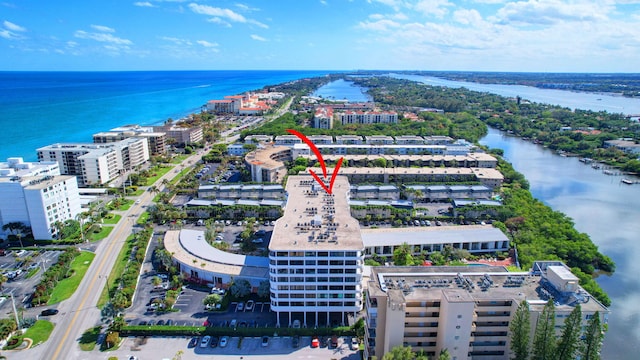 aerial view with a water view and a view of city