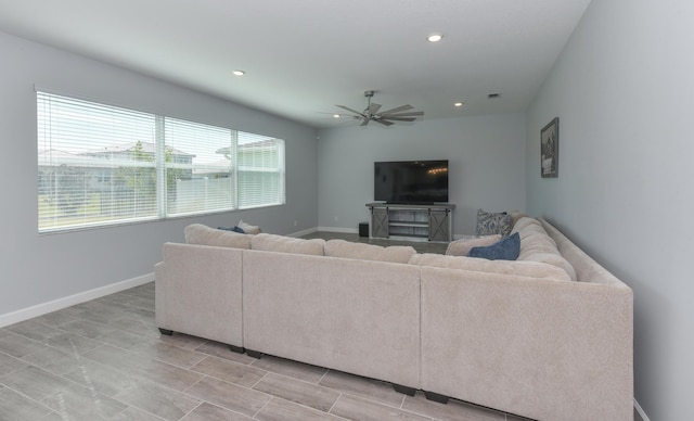 living room featuring ceiling fan