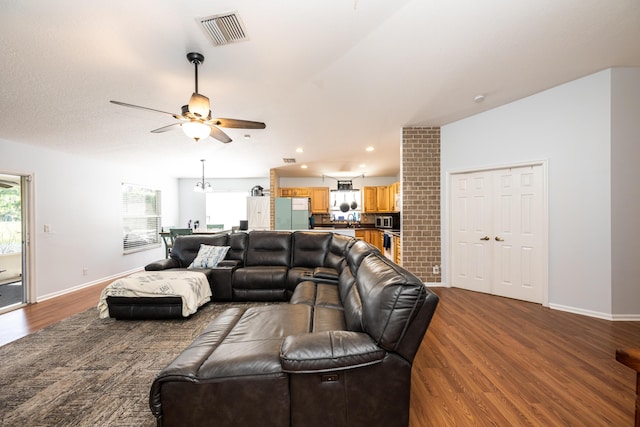 living room with ceiling fan, hardwood / wood-style floors, and a wealth of natural light