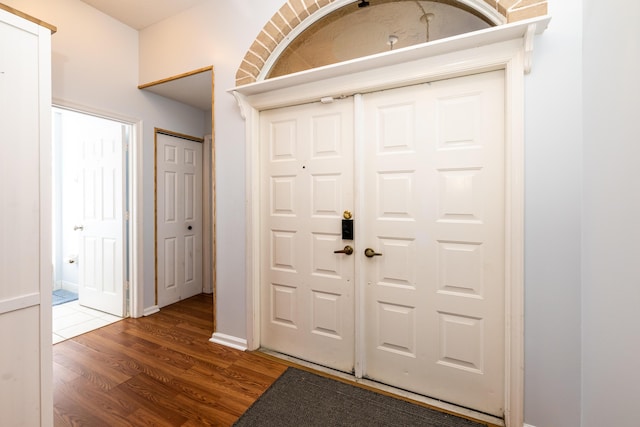 foyer entrance with hardwood / wood-style flooring