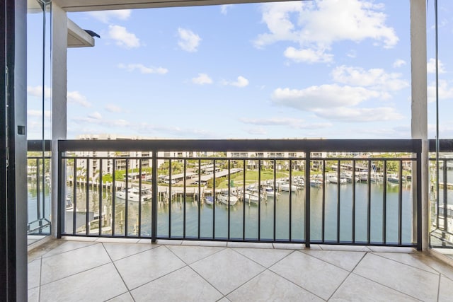 balcony featuring a water view