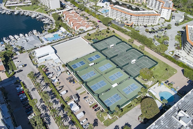 birds eye view of property with a water view