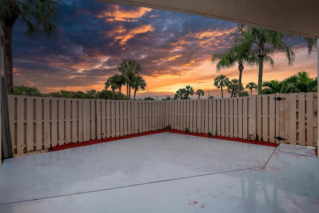 view of patio terrace at dusk