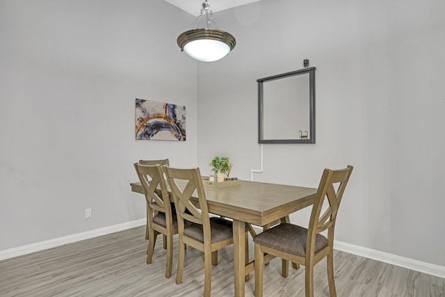 dining room featuring light hardwood / wood-style floors