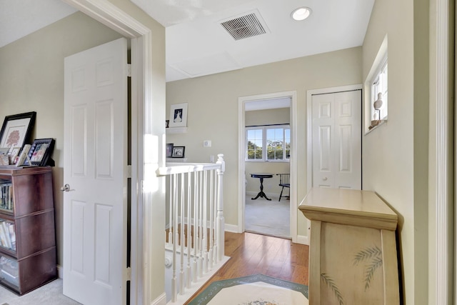 hallway featuring light hardwood / wood-style floors