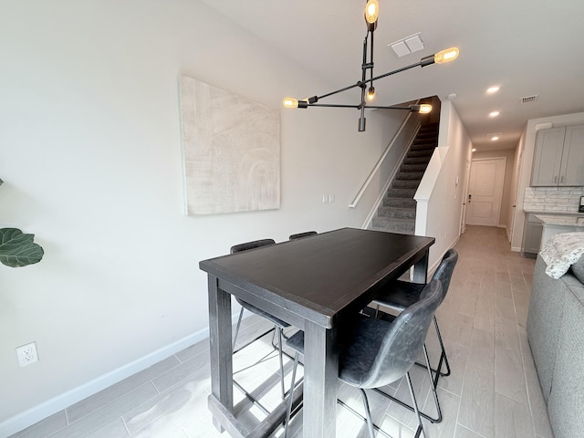 dining area featuring light wood-type flooring