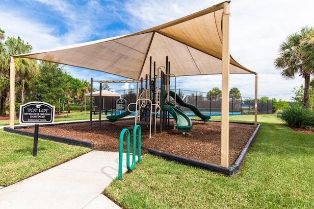 view of jungle gym featuring a yard