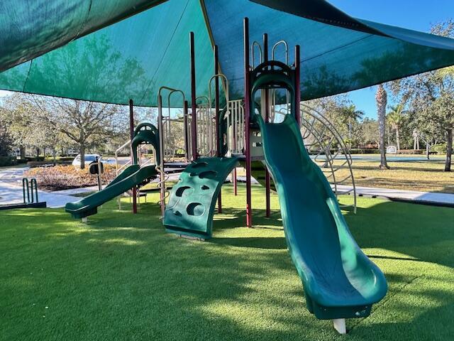 view of playground featuring a water view