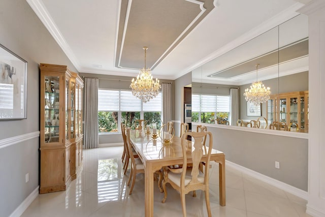 dining space with crown molding, a chandelier, and light tile patterned floors