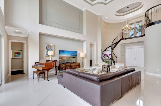 living room featuring a towering ceiling, ornamental molding, light tile patterned floors, and a notable chandelier