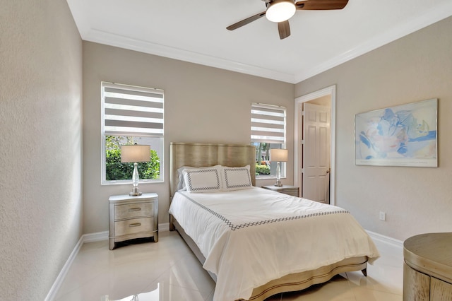 tiled bedroom featuring ornamental molding and ceiling fan