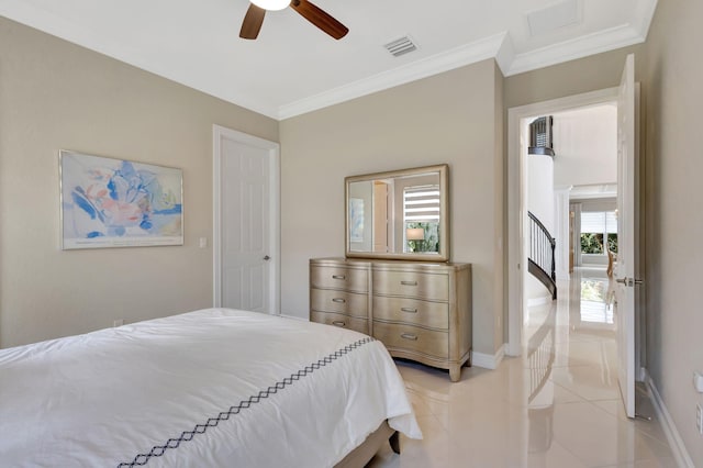 bedroom with ceiling fan, ornamental molding, and light tile patterned floors