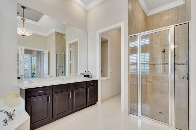 bathroom with vanity, tile patterned floors, ornamental molding, and independent shower and bath