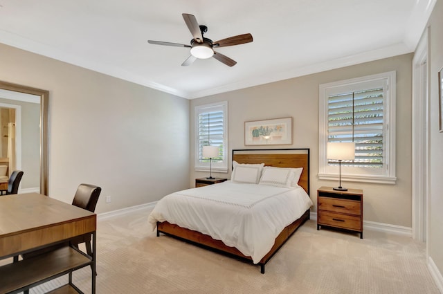 bedroom featuring light carpet, ornamental molding, and ceiling fan