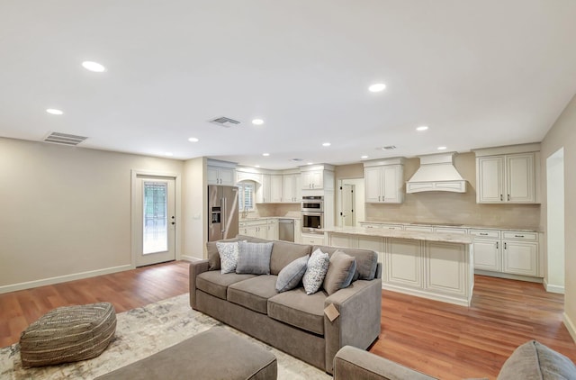 living room featuring light hardwood / wood-style floors