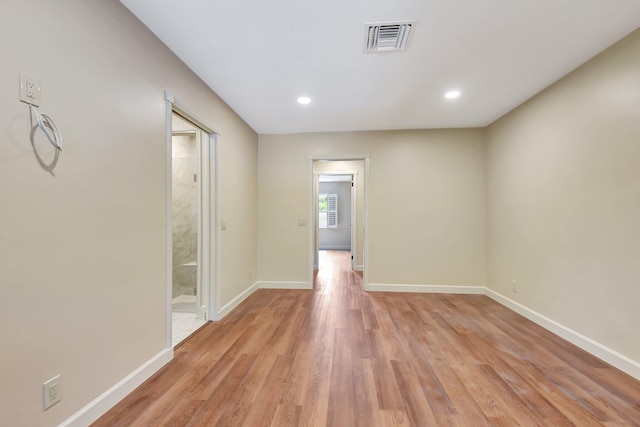 hallway with light wood-type flooring