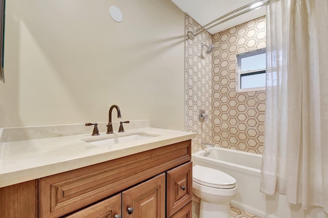 full bathroom with vanity, shower / bathtub combination with curtain, and toilet