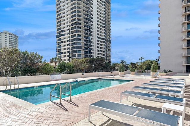 view of pool featuring a patio area