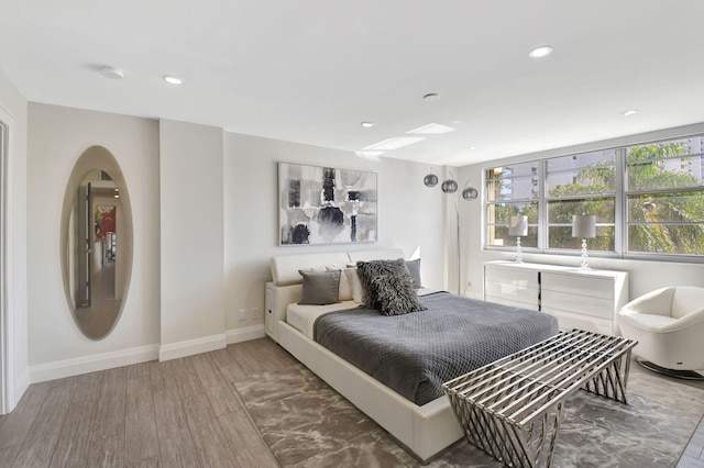 bedroom featuring hardwood / wood-style floors