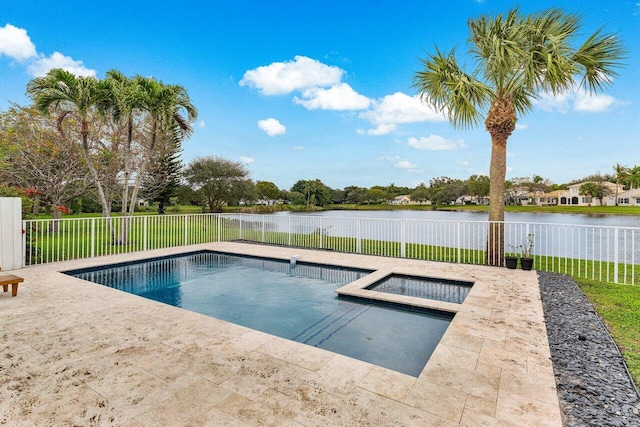 view of pool with a patio area, an in ground hot tub, and a water view