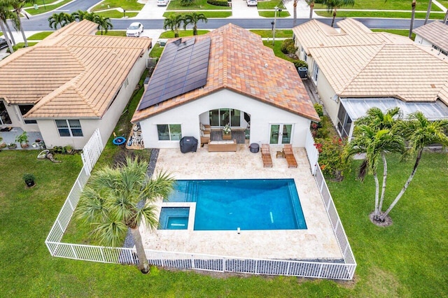 view of swimming pool with an in ground hot tub, outdoor lounge area, and a patio area