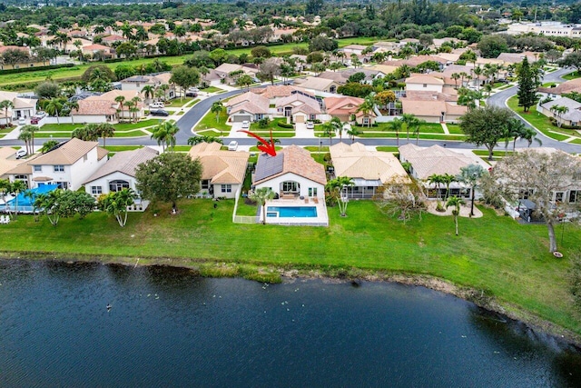 birds eye view of property featuring a water view