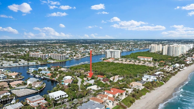 drone / aerial view with a view of the beach and a water view