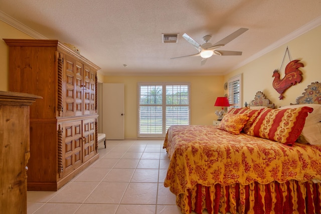 tiled bedroom featuring ceiling fan, crown molding, and a textured ceiling