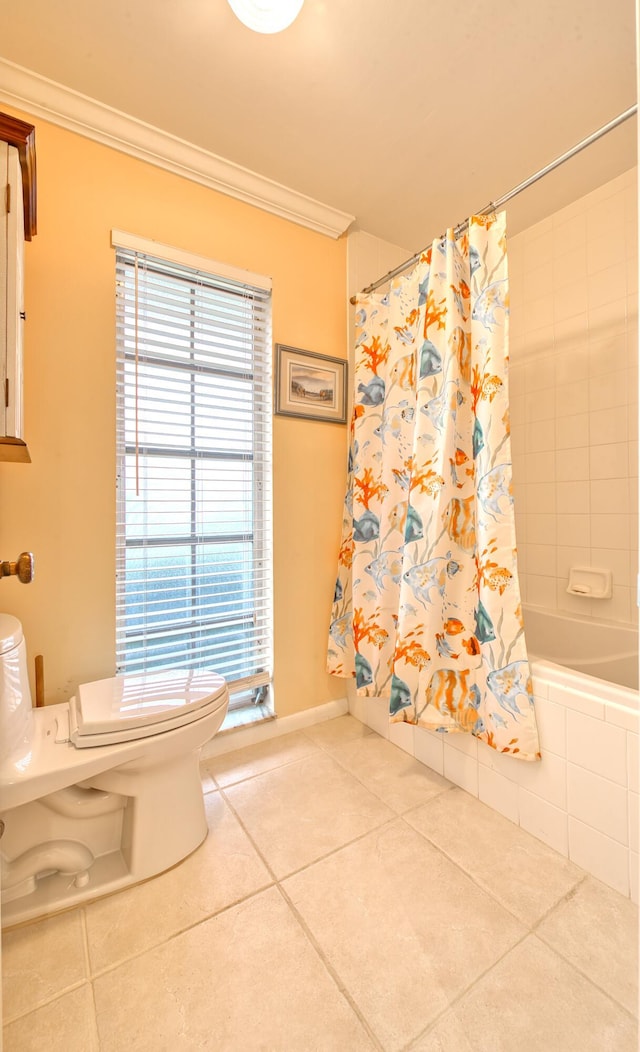 bathroom featuring crown molding, shower / bath combo, and tile patterned floors