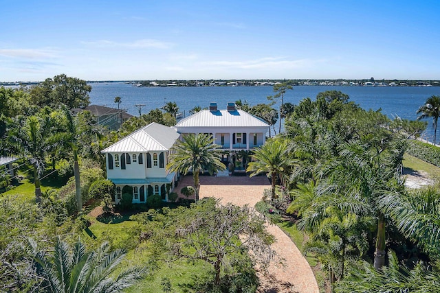 birds eye view of property featuring a water view