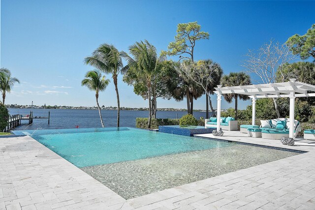 pool featuring a patio and fence