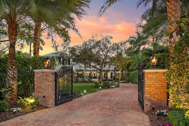 gate at dusk with fence