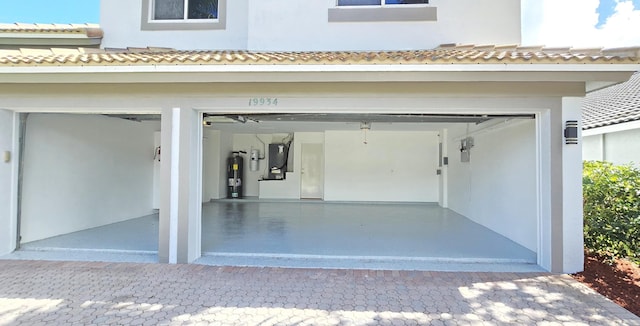 garage with electric water heater