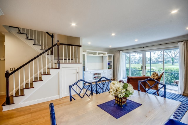 18520 SE Wood Haven Ln Unit L, Jupiter, FL 33469 - dining space with wood finished floors, stairway, recessed lighting, and baseboards