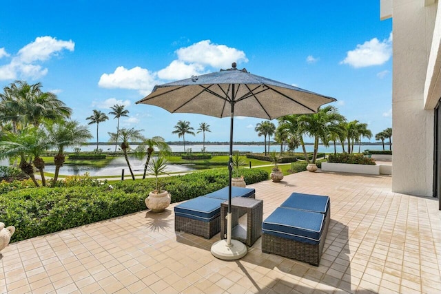 view of patio / terrace featuring a water view