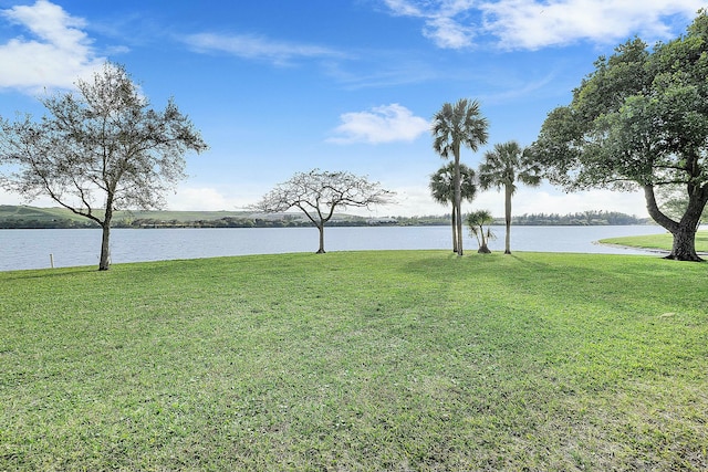 view of yard with a water view