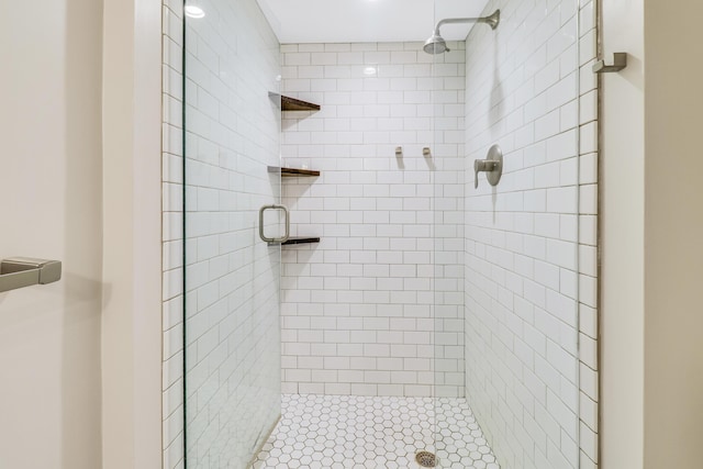 bathroom featuring an enclosed shower